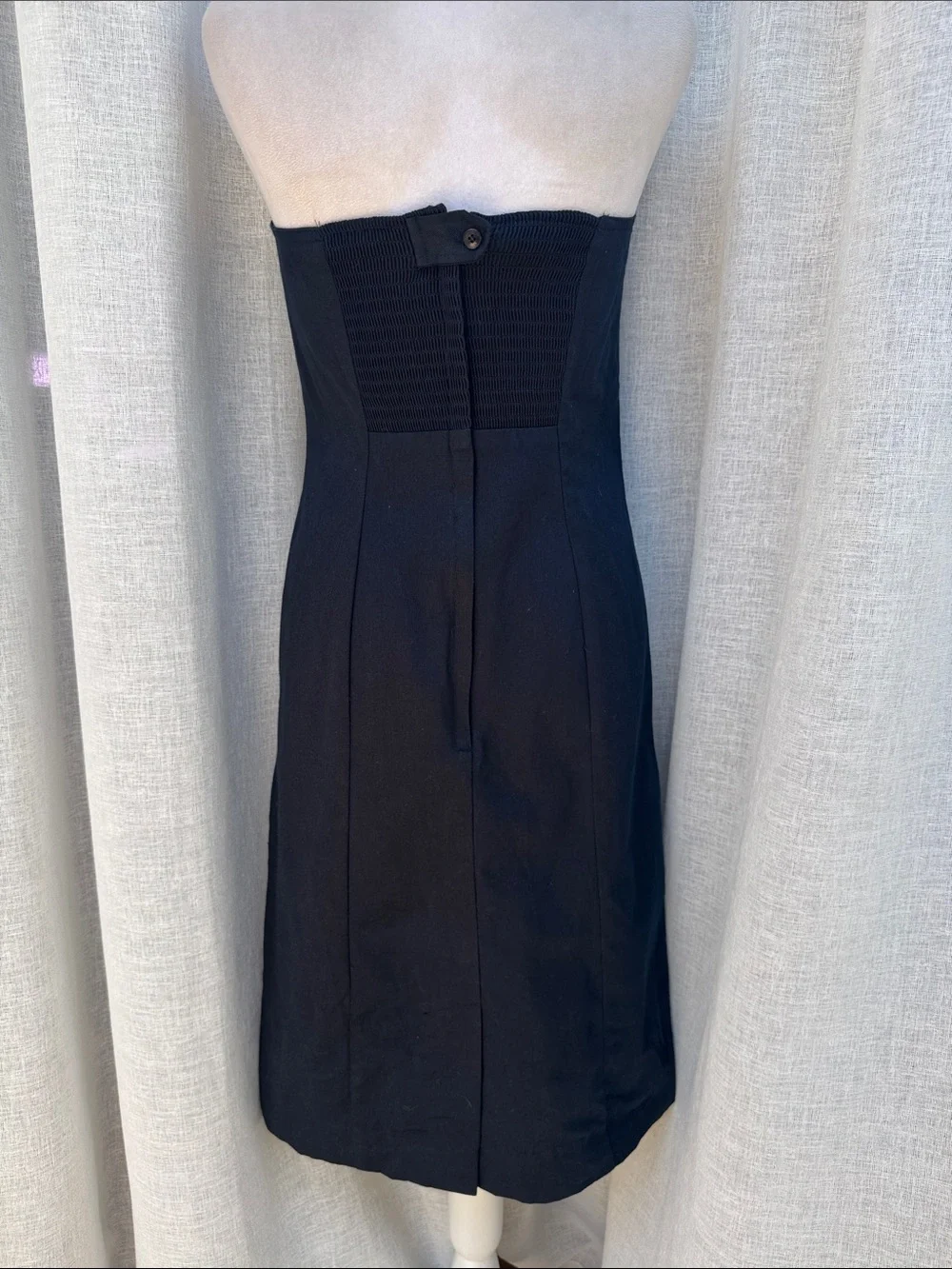 Jillian Arthur 1990s black strapless dress paired with a red bolero crop blazer